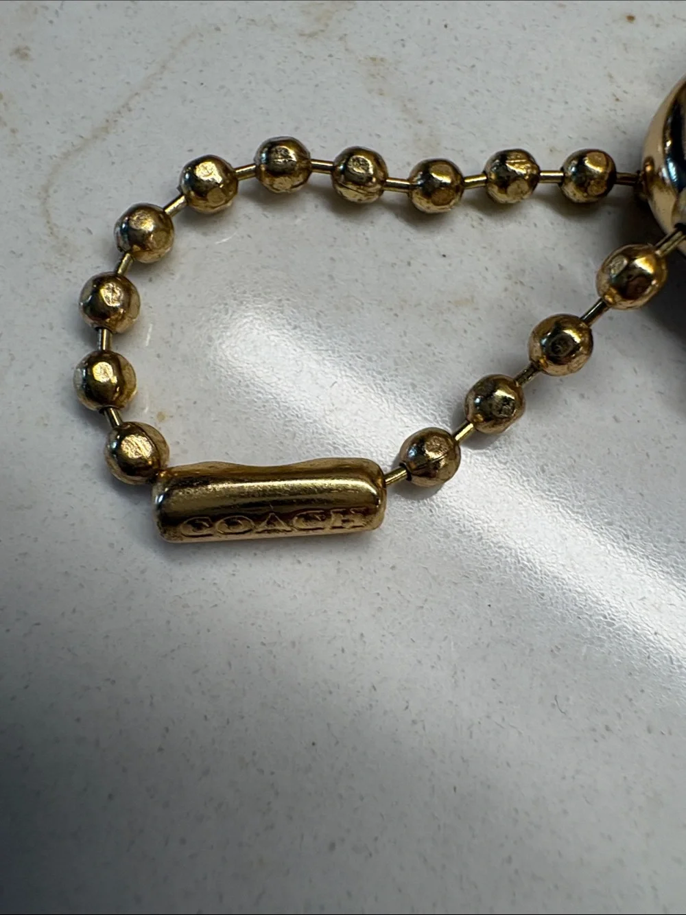 Coach Gold Metal Hangtag